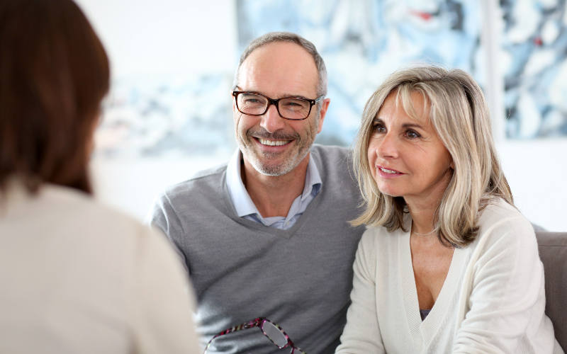 Senior couple and financial advisor